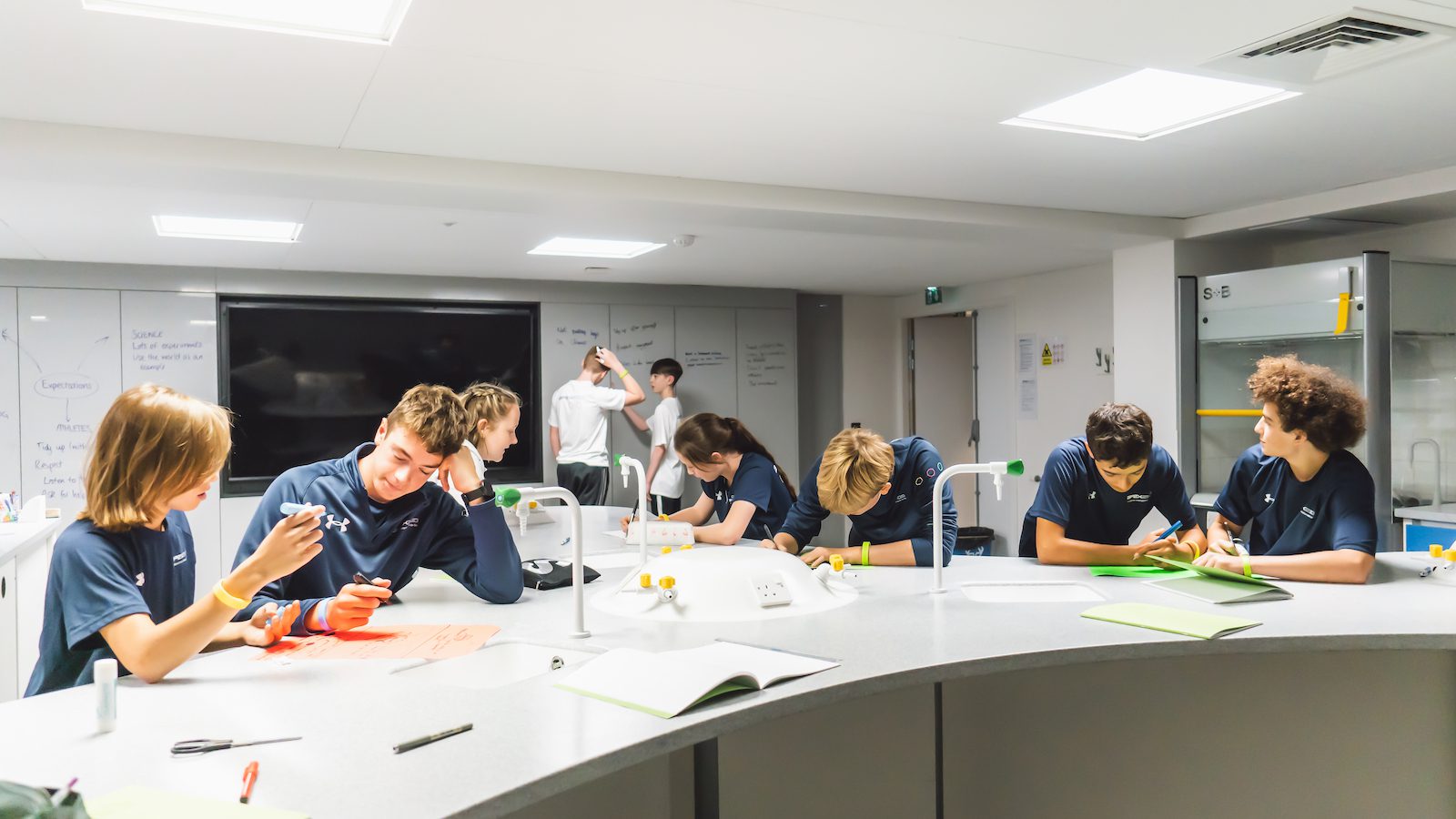 Students at Apex2100 studying in lab