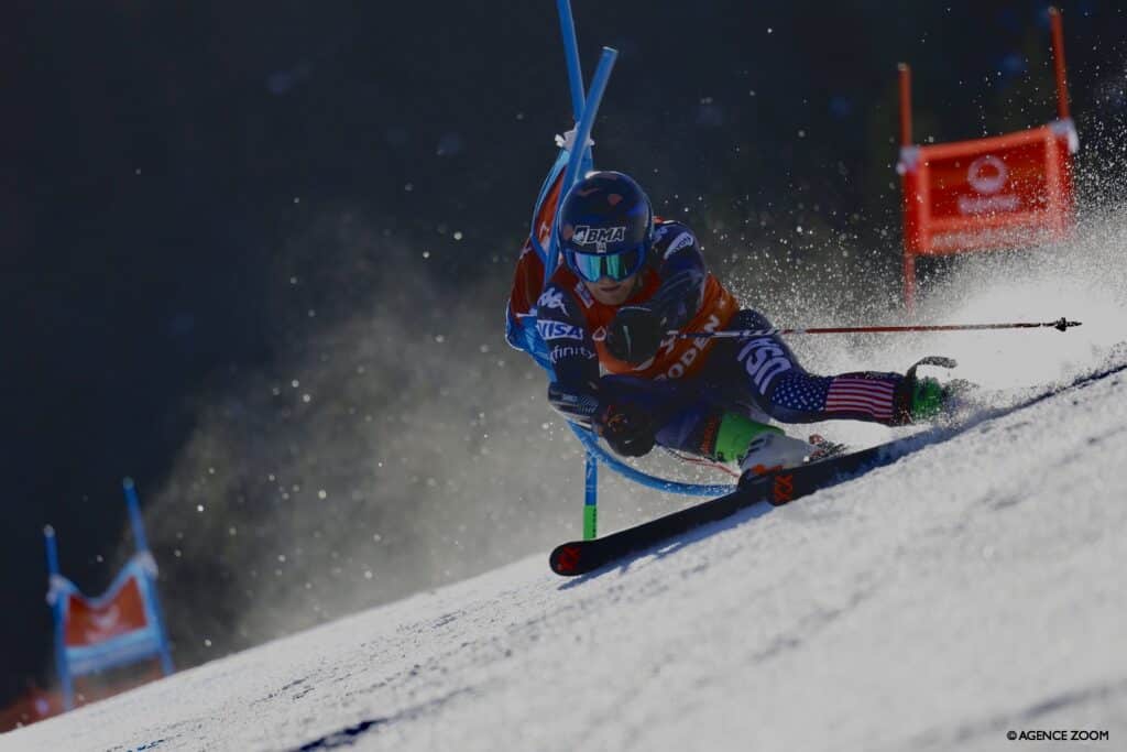 Patrick Kenney carving around a GS gate.